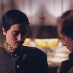 Ancora Theresa Russell in abiti maschili con Nicolas Roeg sul set del segmento da lui diretto in Aria (1987)